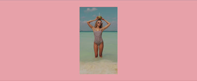 woman in swimwear in vibrant ocean